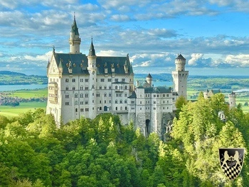 Neuschwanstein Castle surrounded by majestic Bavarian Alps